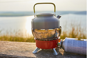 Scenic outdoor cooking at sunset, a Nature Photo by IlliaBondarPhotography