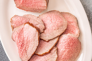 Perfectly sliced roast beef, a Food & Drink Photo by Alexander Prokopenko