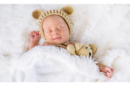 A newborn baby sleeps with a teddy, a Person Photo by yanadjana