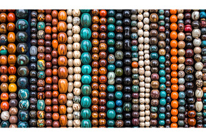 Colorful rows of gemstone beads, a Background Photo by Igor Tichonow