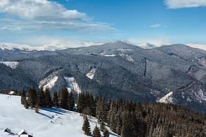 Winter snowy mountains, and lone farmstead, a Nature Photo by YuriyB