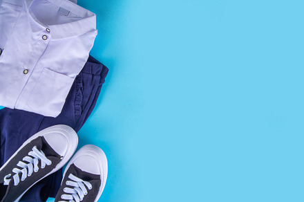 School children's student uniform with pencil case, a Photo by Rimma