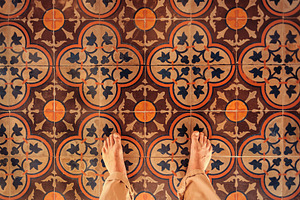 Bare feet on the beautiful tiles