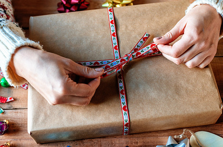 Hands wrapping christmas gifts stock photo containing christmas and santa