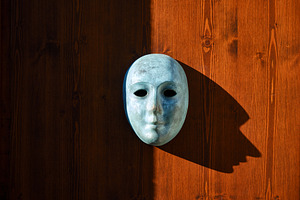 Venetian mask on wooden background, an Arts & Entertainment Photo by BOOCYS