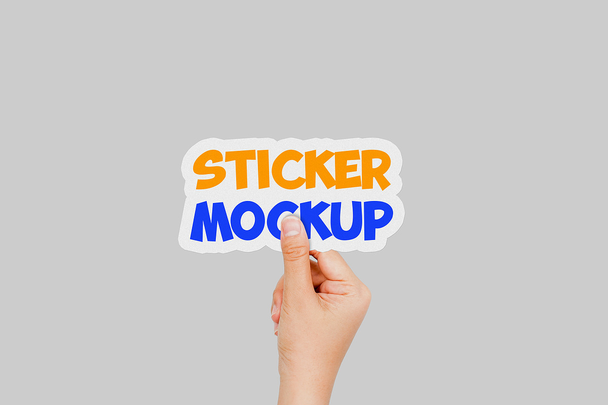 Hand Holding Sticker Mockup