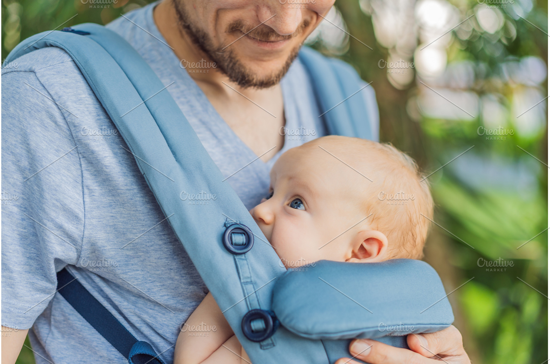 Young father walks in nature with, a Person Photo by Elizaveta Galitskaya