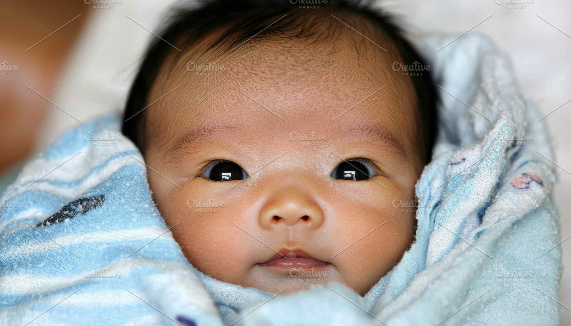 Newborn chinese baby sleeping peacef, a Photo by Dvoevnore photos