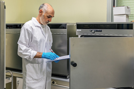 Laboratory technician recording data