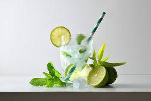 Refreshing lime and mint drink with ice  white isolated backgrou, a Food & Drink Photo by Davizro's Market
