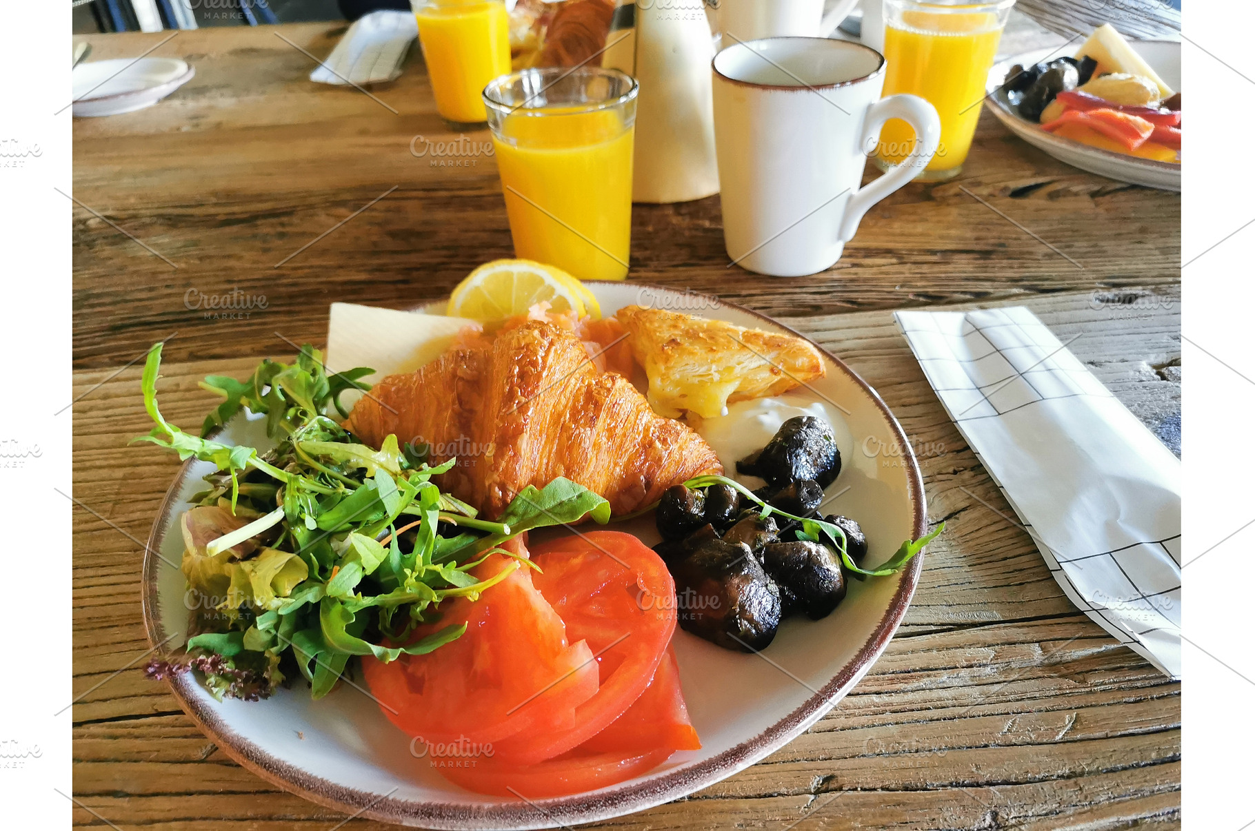 Croissant, tomato, mushrooms, greens, a Food & Drink Photo by sceptical cactus