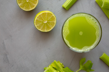 Refreshing Organic Celery Juice with Lime in a Glass, top view., a Food & Drink Photo by LiudmylaChuhunova
