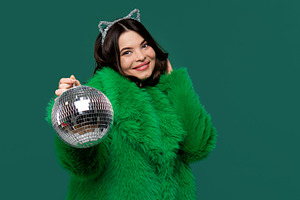 Smiling woman in green fur coat, a Person Photo by Elena Vagengeim