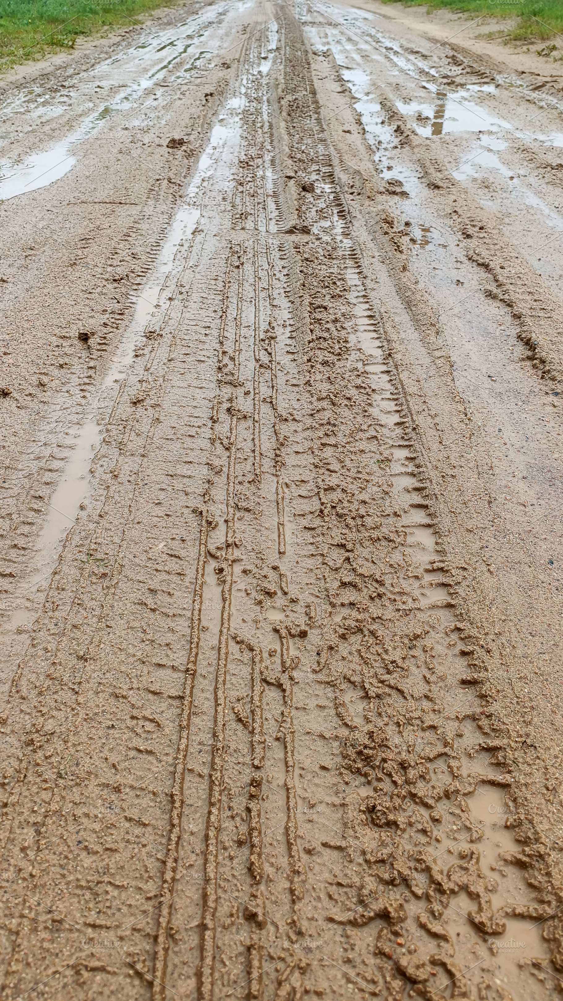Dirty road after rain with car marks, a Nature Photo by Nastya_Velko