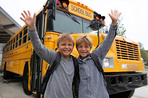 Two cheerful boys with backpacks, a School & Education Photo by MistyDay