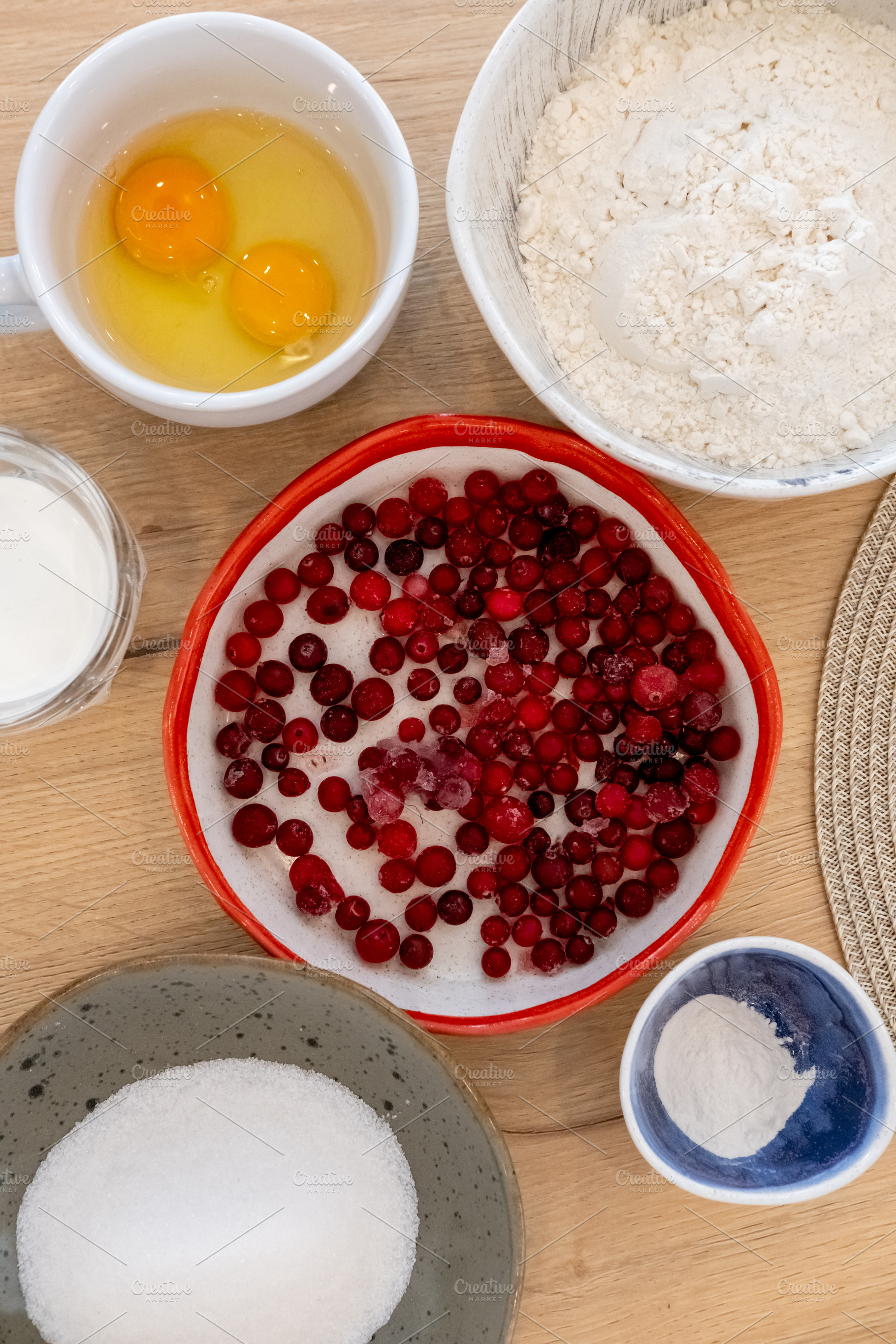 Baking ingredients cranberry recipe bowls table, a Food & Drink Photo by Photo Drive Studio