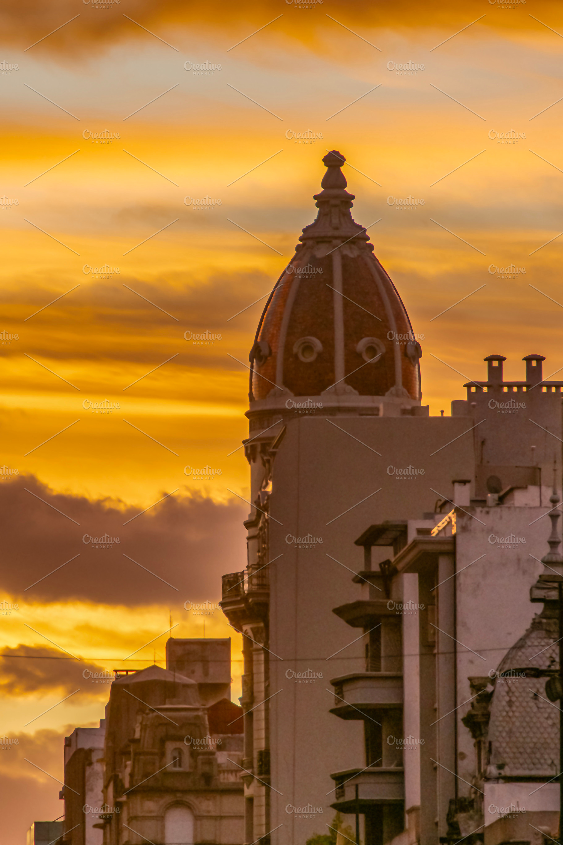 City  buildings silhouette at sunset, an Architecture Photo by DanFLCreativo