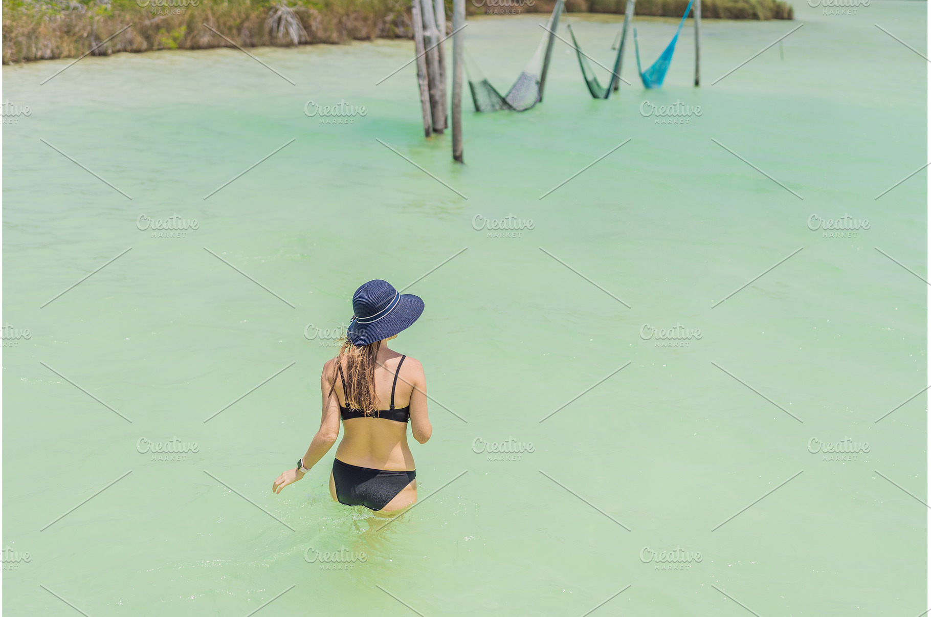 Woman enjoying the crystal-clear, a Nature Photo by Elizaveta Galitskaya