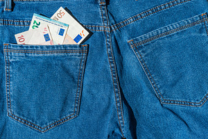 Money in blue jeans pocket, a Business Photo by Vapi