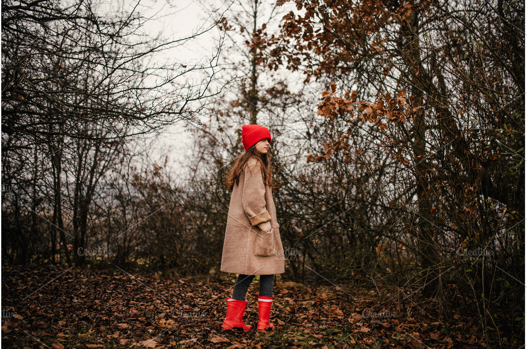 Young girl standing in nature, a Nature Photo by HalfPoint