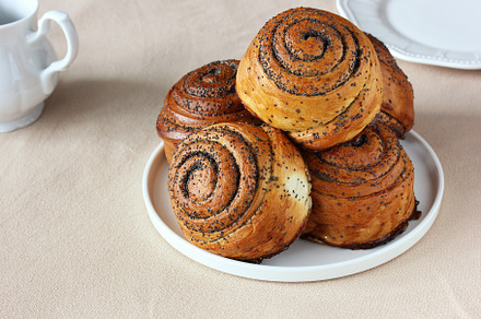 sweet rolls with poppy seeds, flour, a Food & Drink Photo by BalaguR