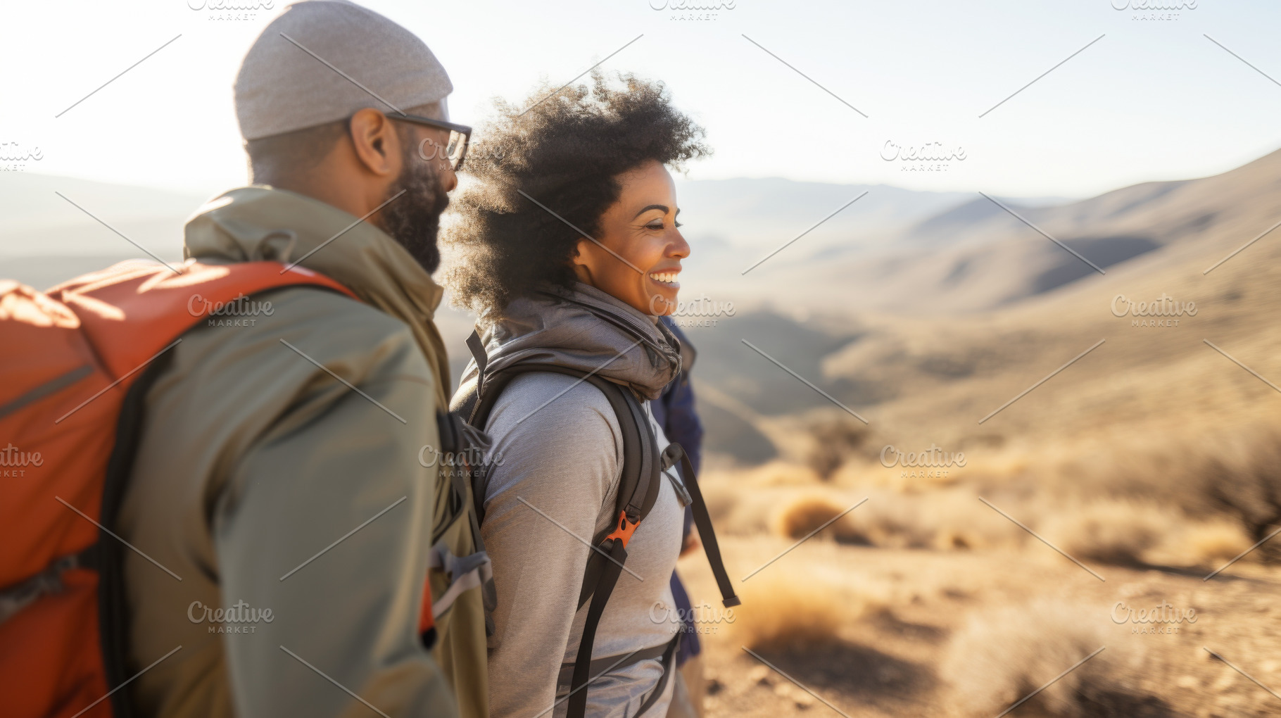 Mixed race couple hiking in desert l, a Photo by Dvoevnore photos