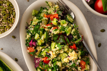Millet porridge with mixed salad, a Food & Drink Photo by Pandateam