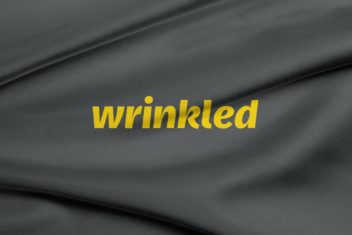 Wrinkled Logo Mockup Collection, an Apparel Mockup by Fields (Photo 3 of 19)
