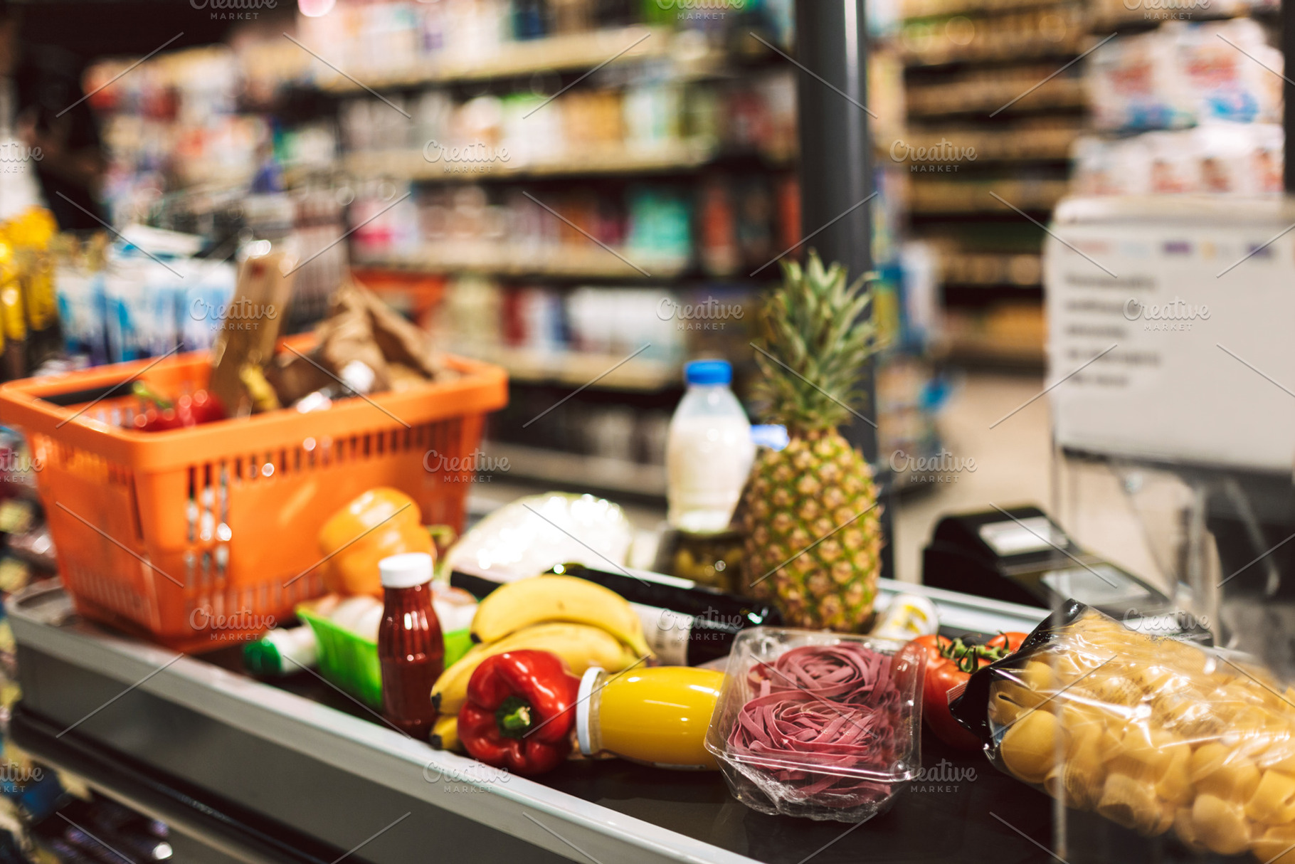 Close up shopping basket and fresh p stock photo containing supermarket, a Food & Drink Photo by Garetsworkshop