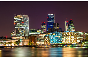 Skyscrapers of the City of London at night - England, an Architecture Photo by Leonid Andronov