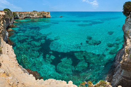 Faraglioni at Torre Sant Andrea, Italy, a Nature Photo by YuriyB
