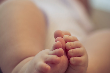 Baby feet stock photograph