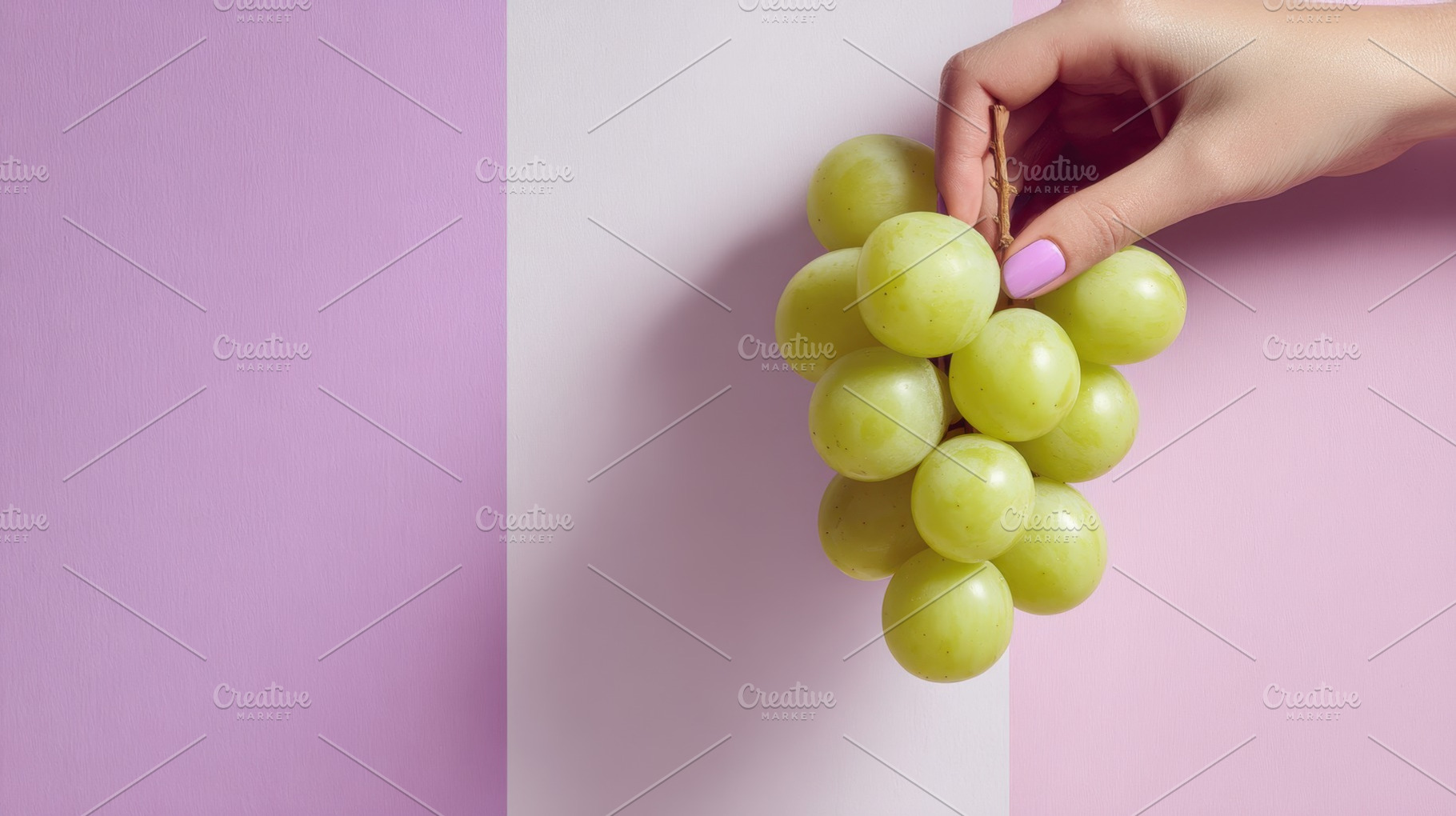 Hand holding green grapes, a Photo by Beautiful things