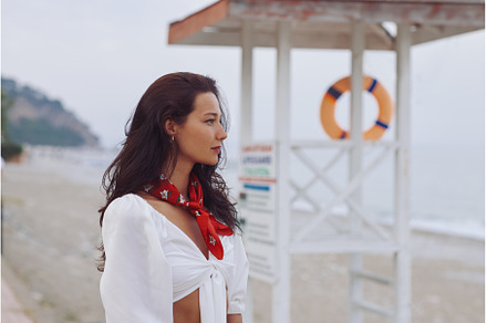 Woman in Elegant Beach Outfit, a Person Photo by Emotion photo