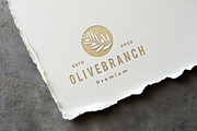 Gold Debossed Paper Logo Mockup, a Mockup by Design Squad (Thumbnail 3 of 4)