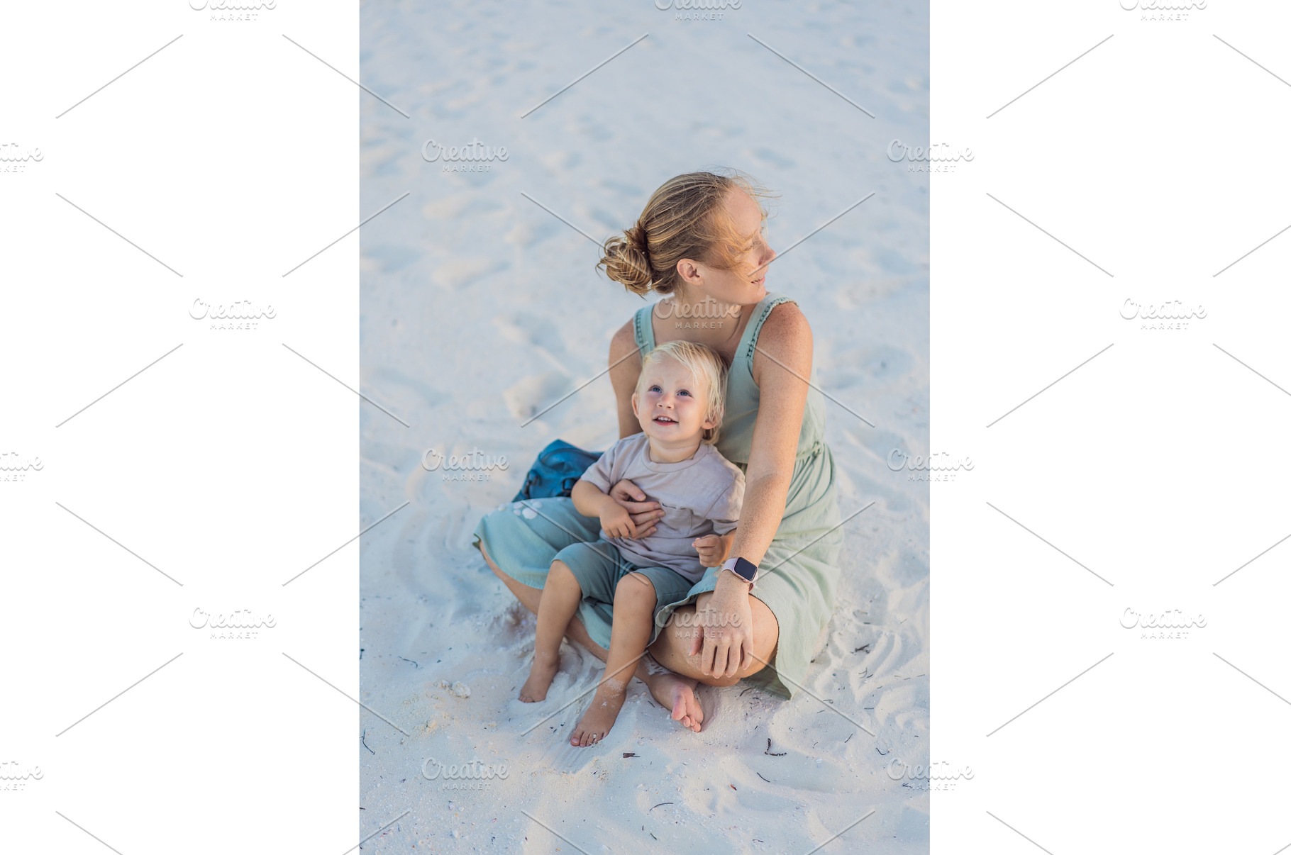Mother and her little son sitting on, a Nature Photo by Elizaveta Galitskaya