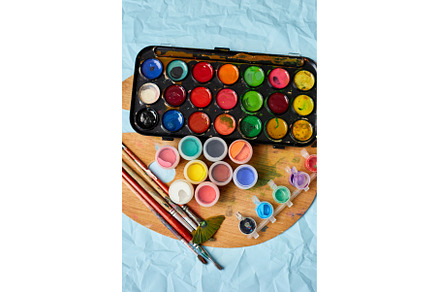 Flat lay of colorful paints, an Arts & Entertainment Photo by IlliaBondarPhotography