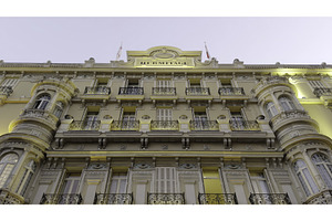 Ornate facade of the hermitage hotel, an Architecture Photo by Media Whale Stock