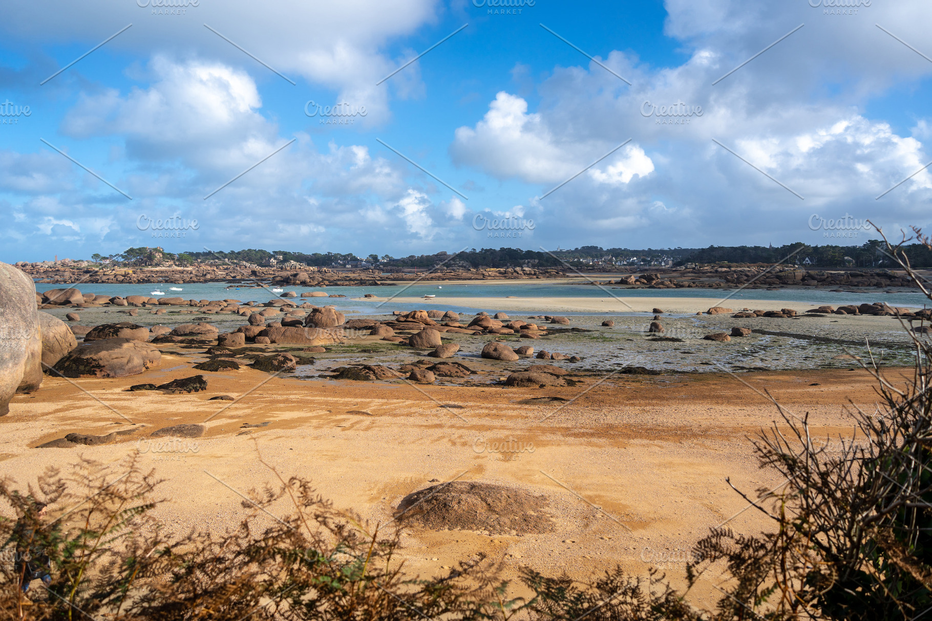 Granite chaos landscape facing Mean Ruz lighthouse in Tregastel,, a Nature Photo by GoodGoods