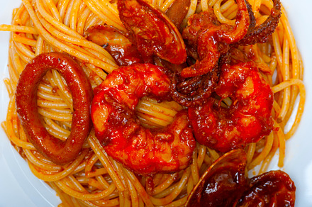 Italian seafood spaghetti pasta on red tomato sauce, a Food & Drink Photo by keko64