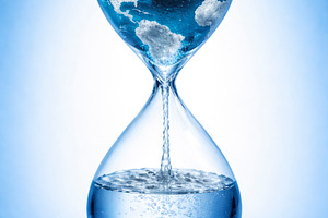 a water hourglass with world map, generative AI, a Photo by Nito