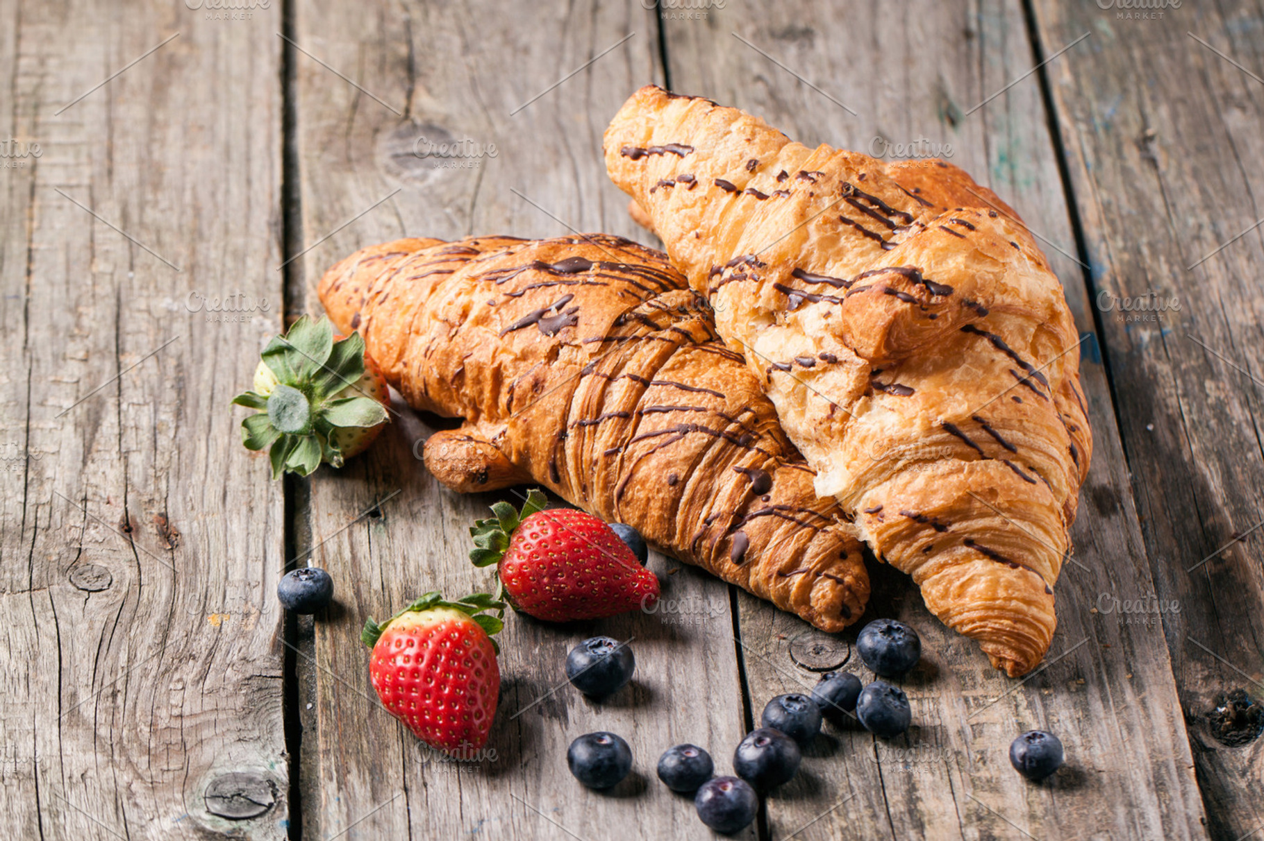 Croissant and berries containing breakfast, croissant, and pastry