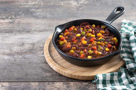 Mexican chilli beans with vegetables in iron pan