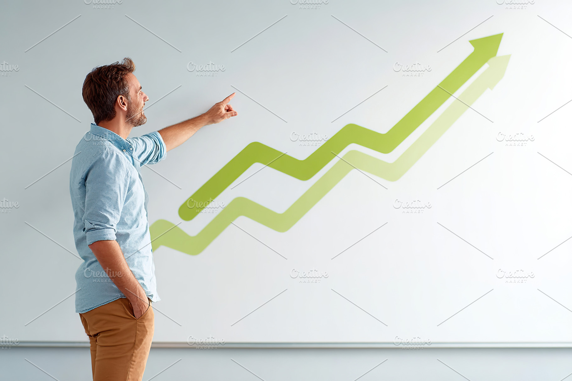 Presenter gestures towards a growing graph on the wall during a business meetin, a Business Photo by AlyaAnd