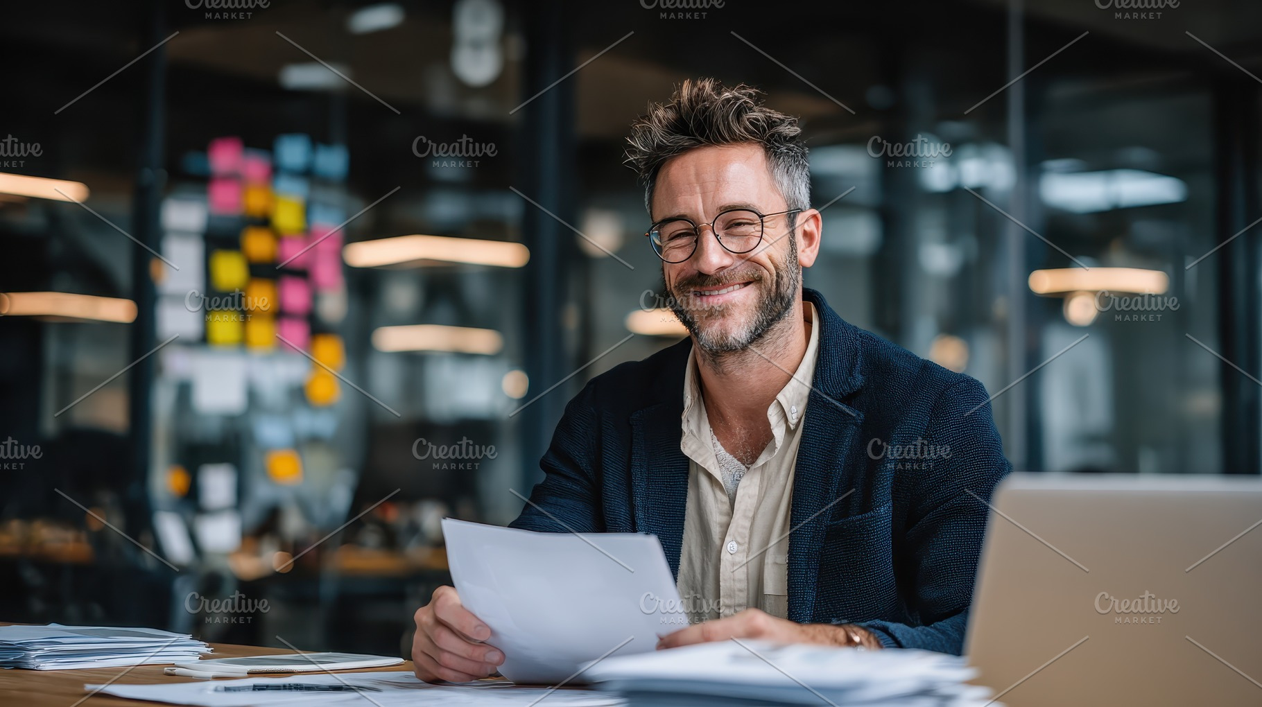 Happy businessman reviewing document, a Photo by Pixeness Studio