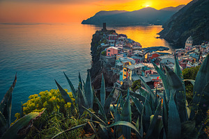 Vernazza village on the cliffs, an Architecture Photo by Alpine Dreams