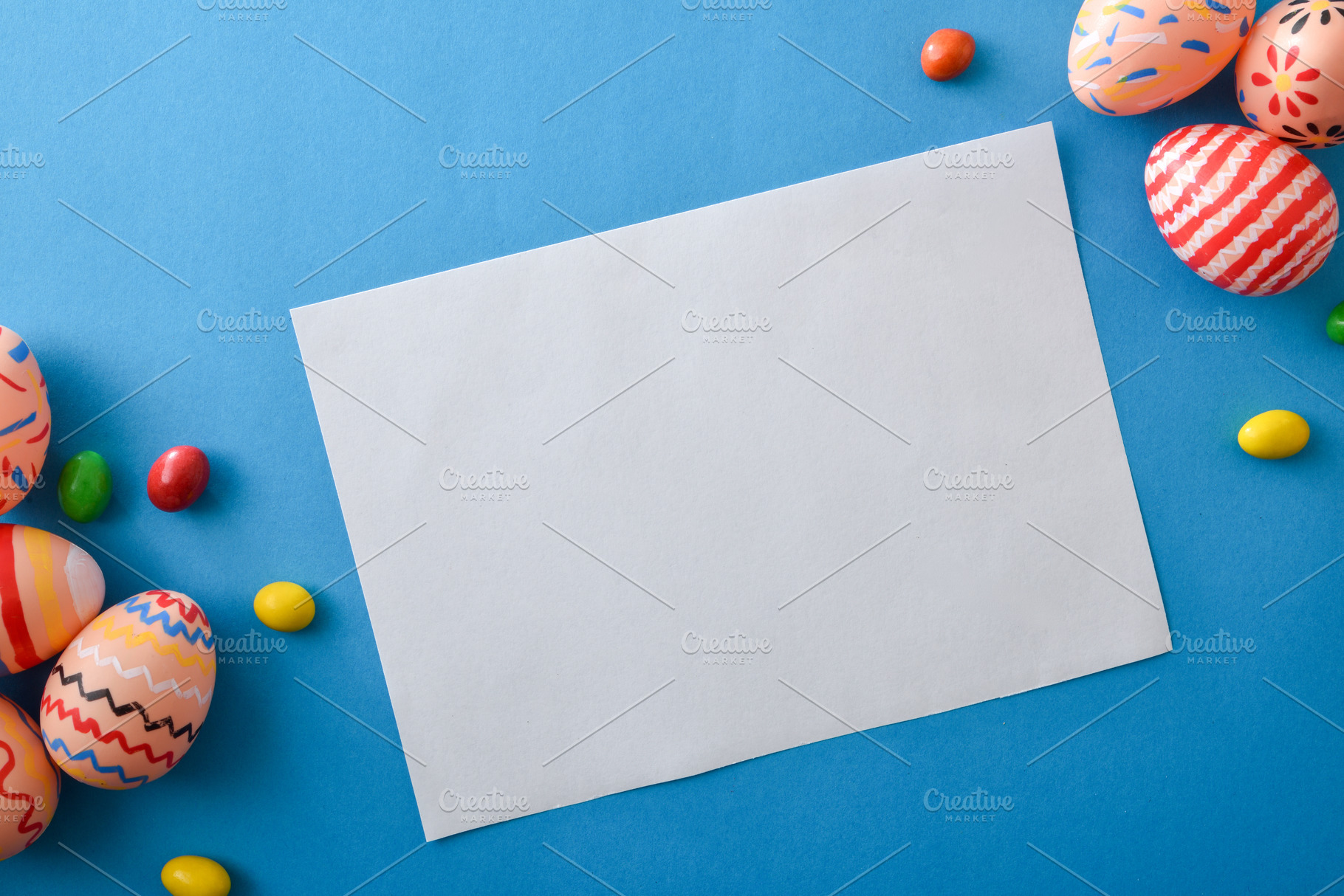 Blank Card with Easter Eggs on Blue Background, a Holiday Photo by Davizro's Market