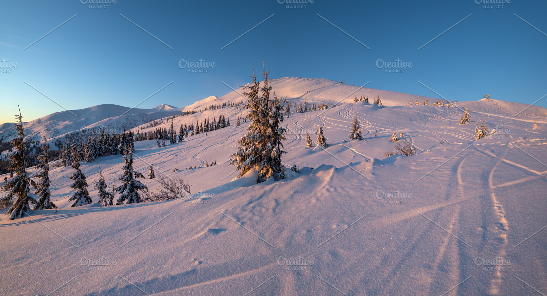 Alpine resort ski slopes and lifts. Pre sunrise morning Svydovet, a Nature Photo by YuriyB