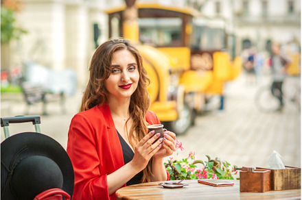 Tourist young caucasian woman in red, a Person Photo by okskukuruza