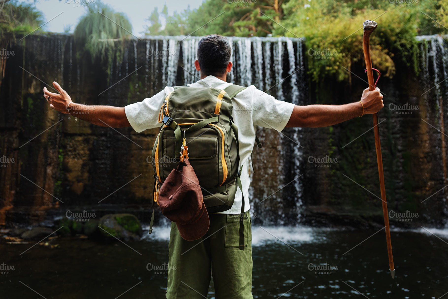 Hiker with walking stick in front of, a Person Photo by Perpis